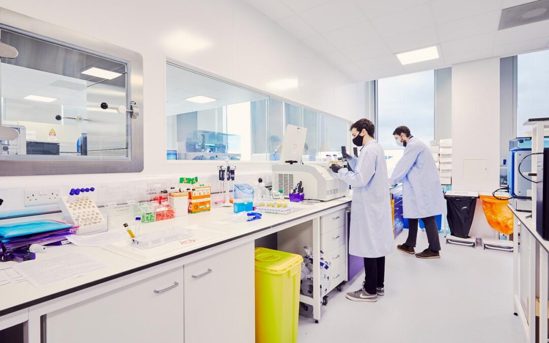Two men in lab coats working in laboratory