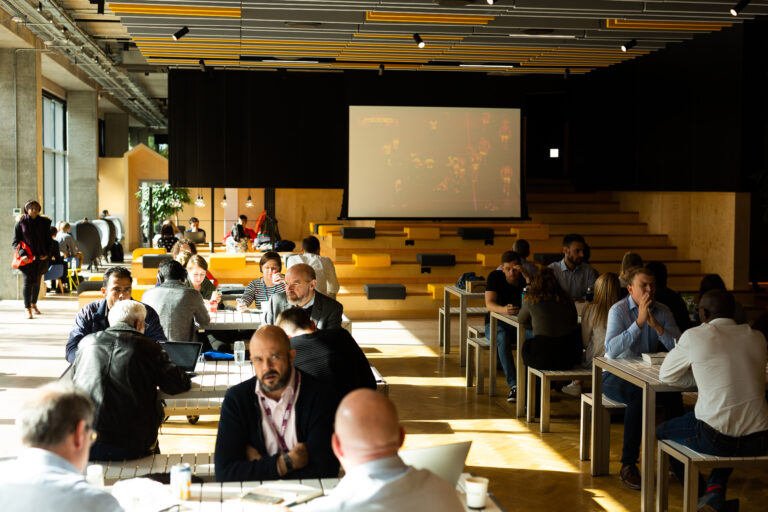 people sat on tables networking