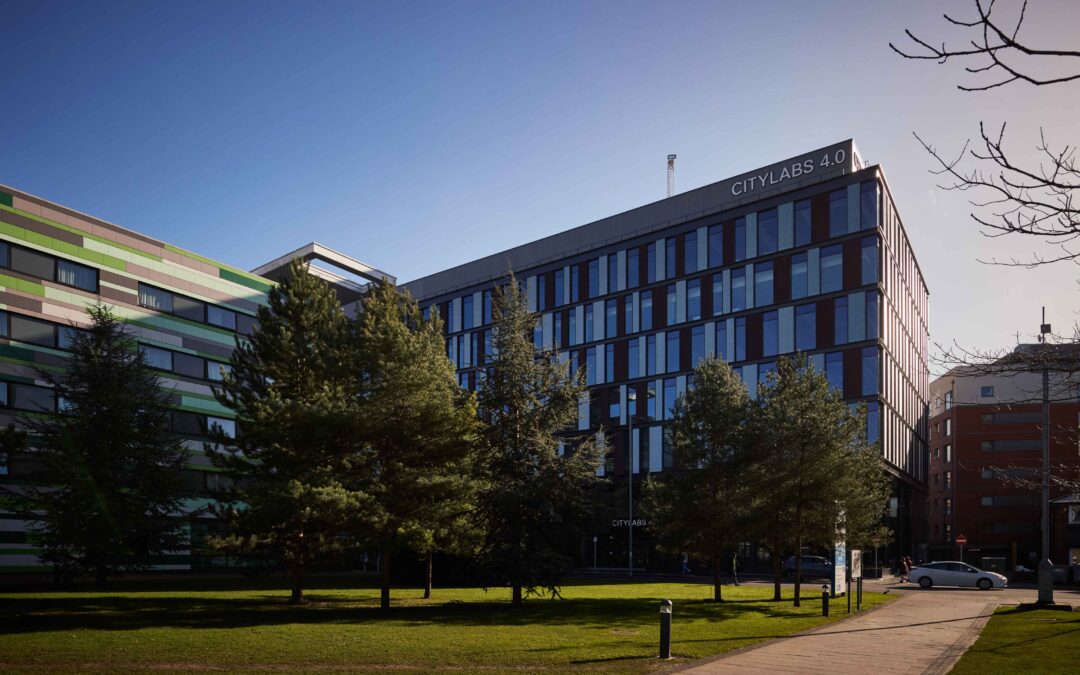 External shot of citylabs 4.0 with red, white and glass pannelling against blue skyline